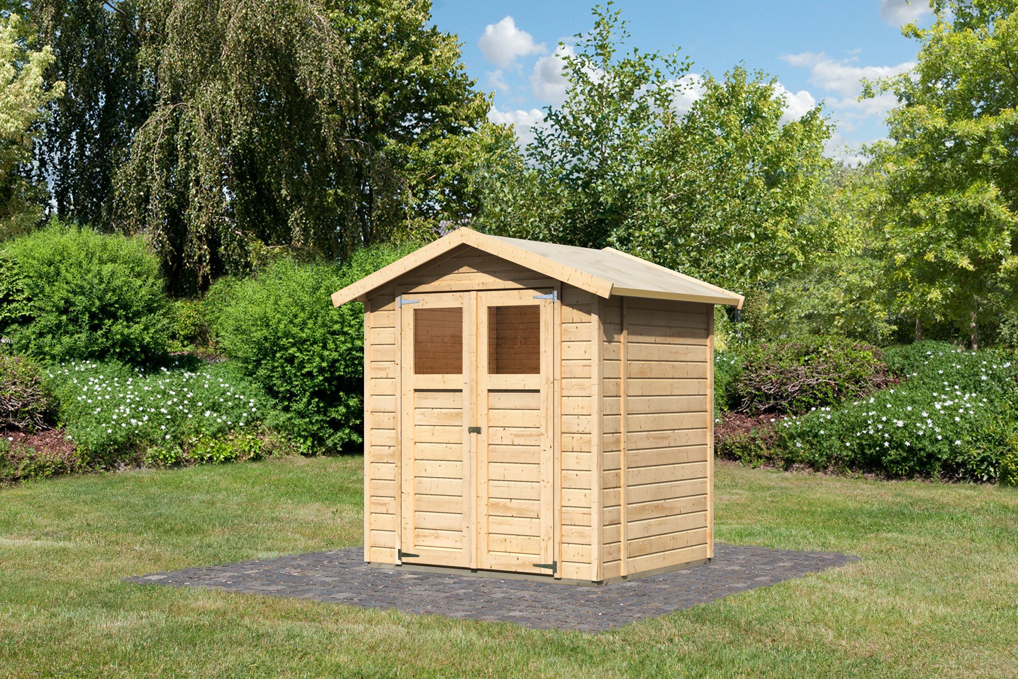 Karibu kleines Gerätehaus Dahme 2 aus Holz, im Garten aufgebaut