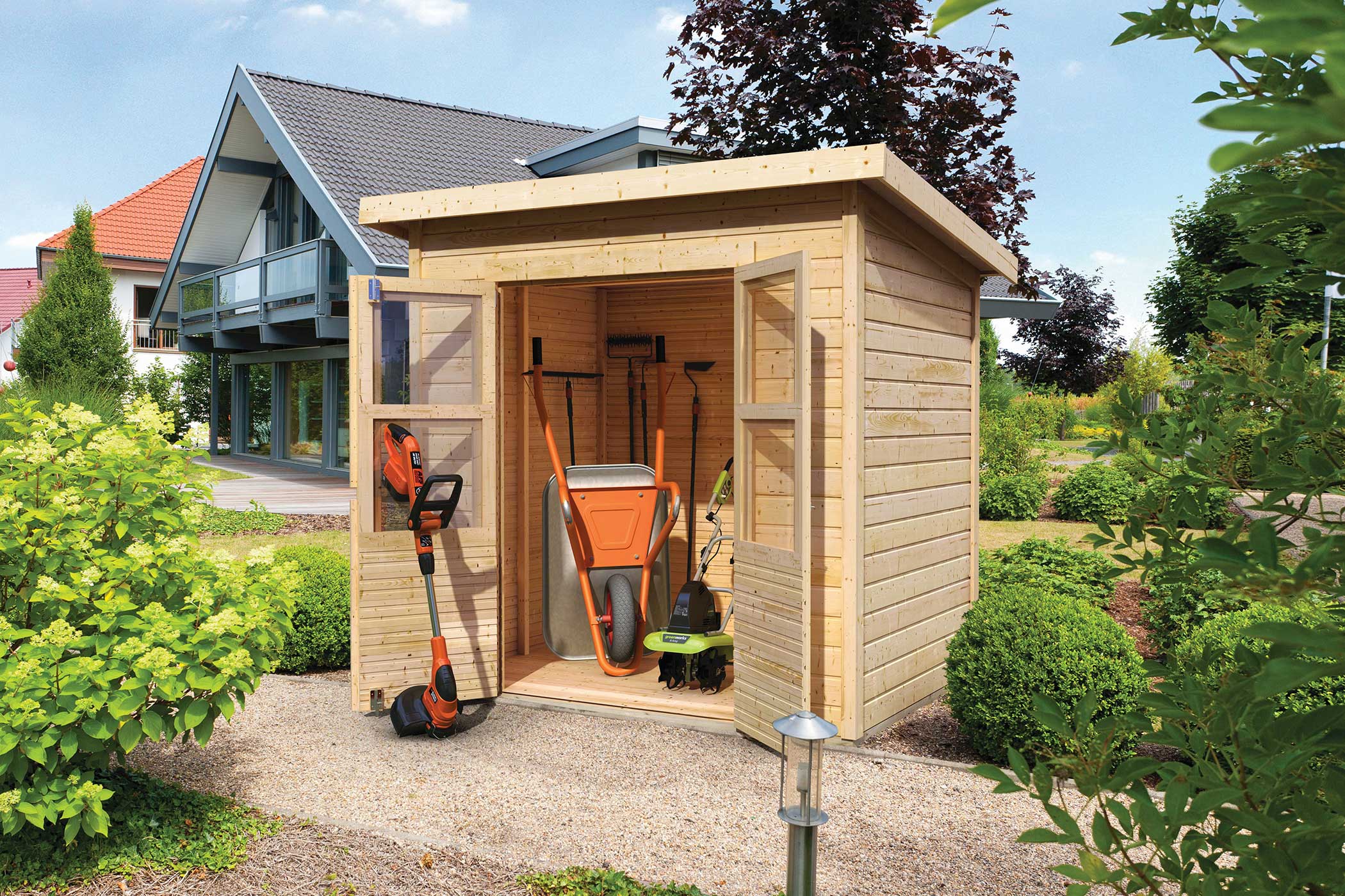 Karibu Gerätehaus Merseburg 3 in Naturbelassen im Garten